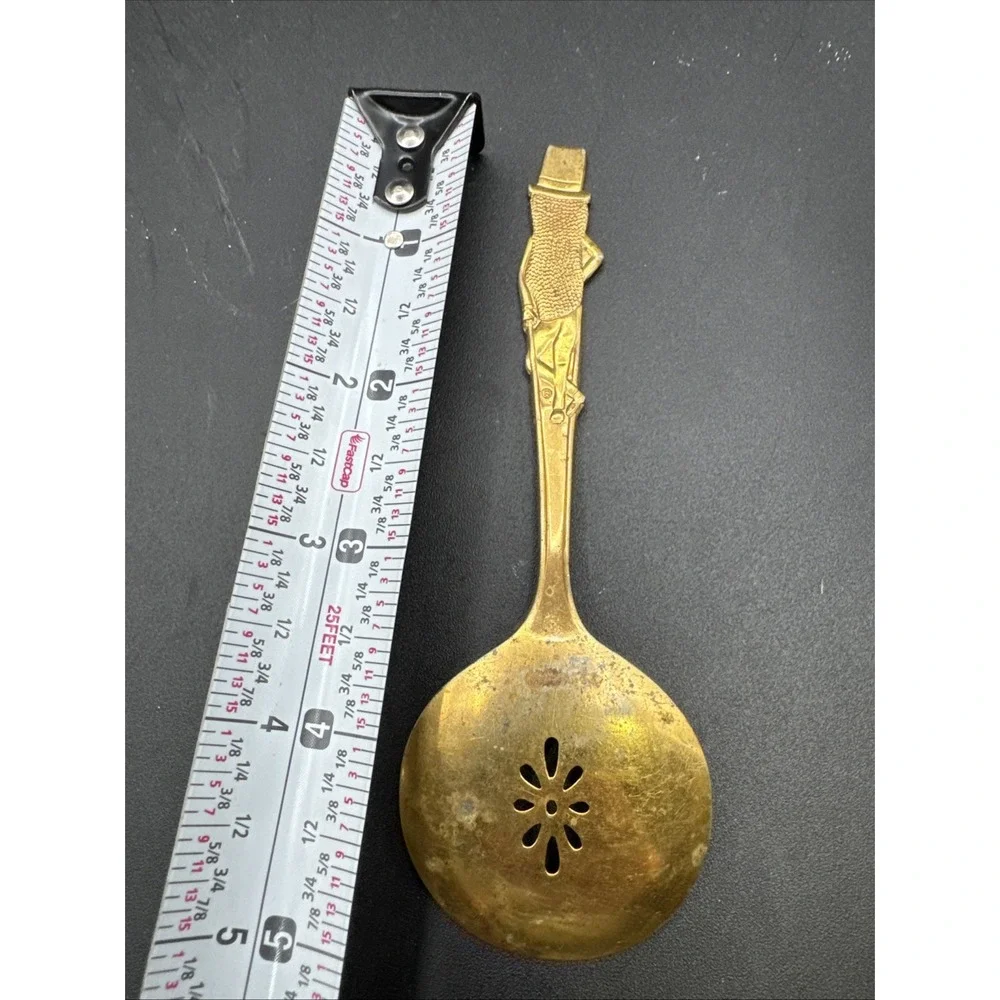 Vtg gold-toned Planters Mr Peanut advertising slotted serving spoon